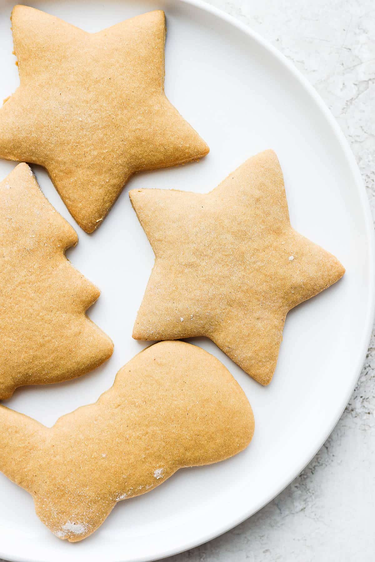 Cut-out cookies on a plate.