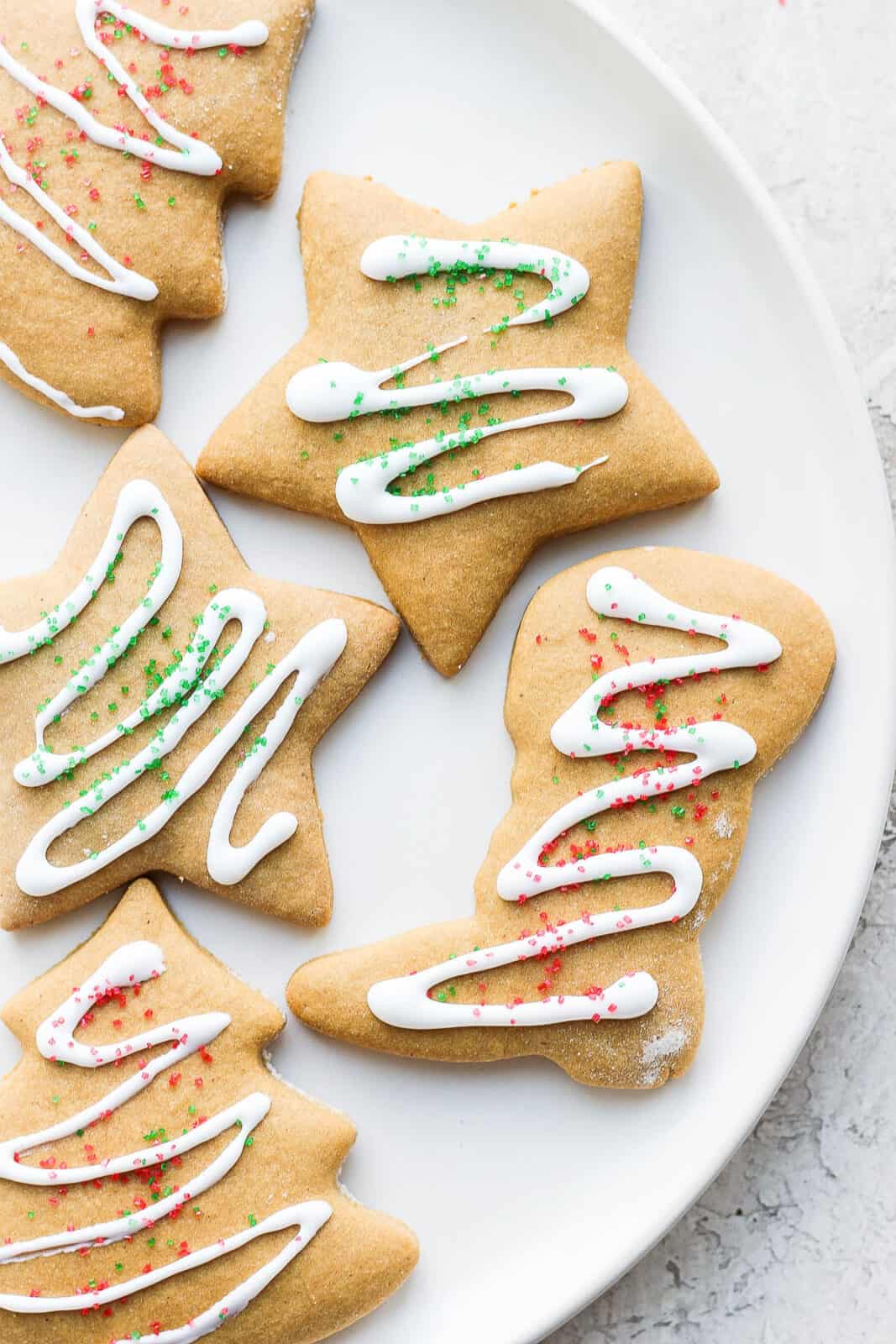 Decorated cut-out cookies on a plate.