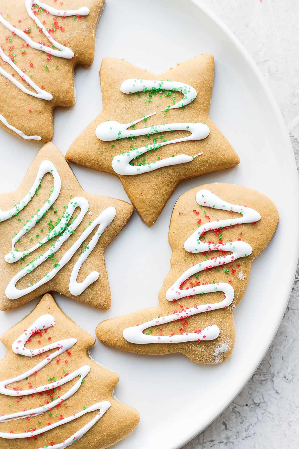 Decorated gluten free sugar cookies on a plate.