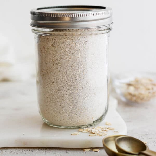 Mason jar full of oat flour.