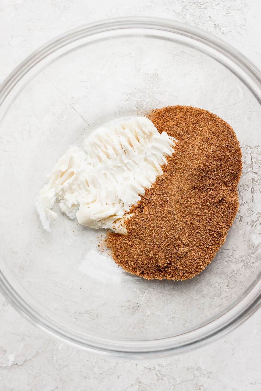 Soft vegan butter and coconut sugar in a mixing bowl.