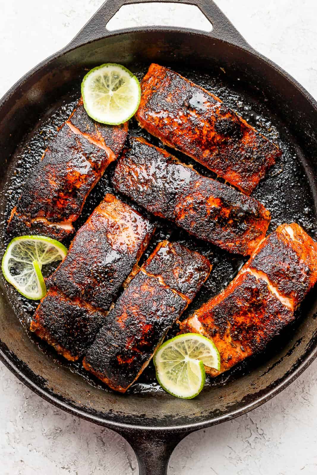 Fully cooked blackened salmon fillets.
