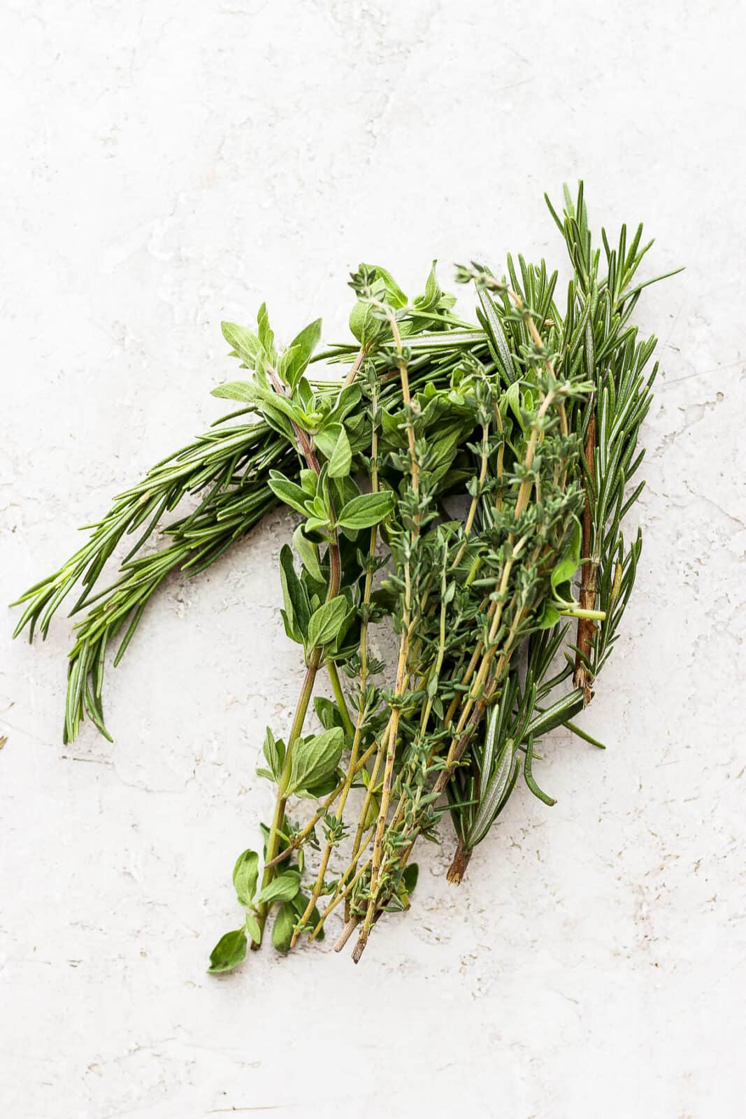 Fresh herbs on the counter.