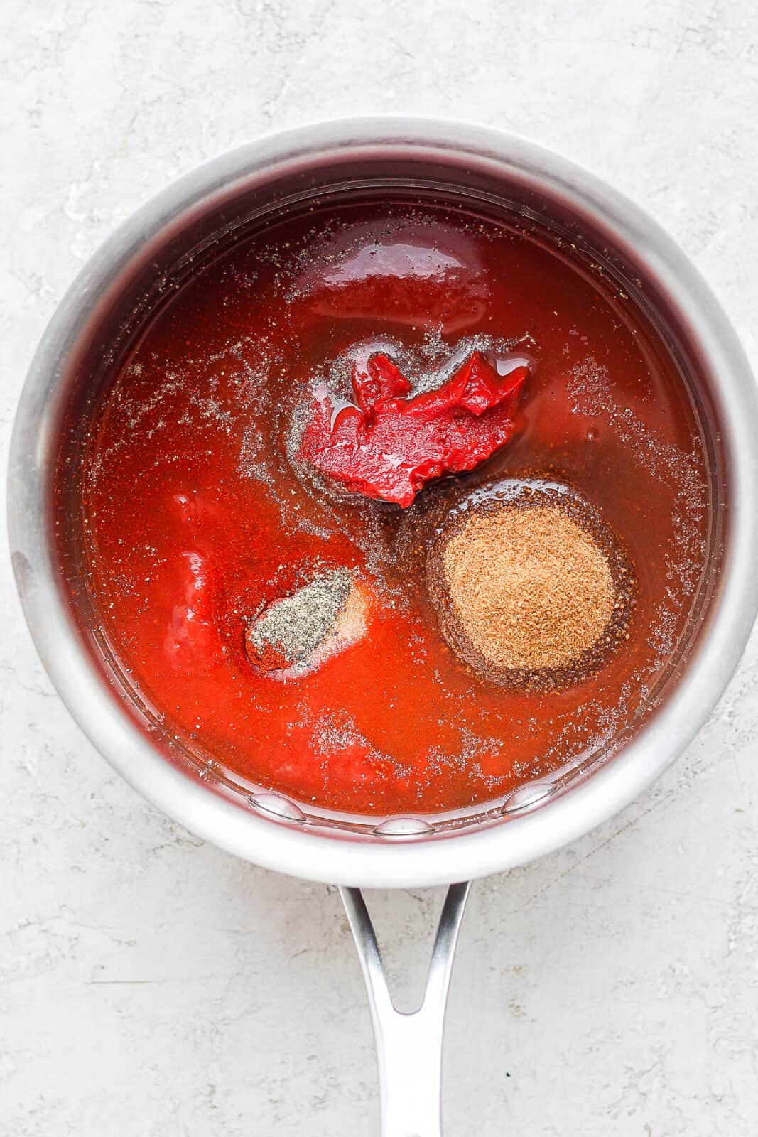 All the ingredients added to a small saucepan but not mixed together yet. 