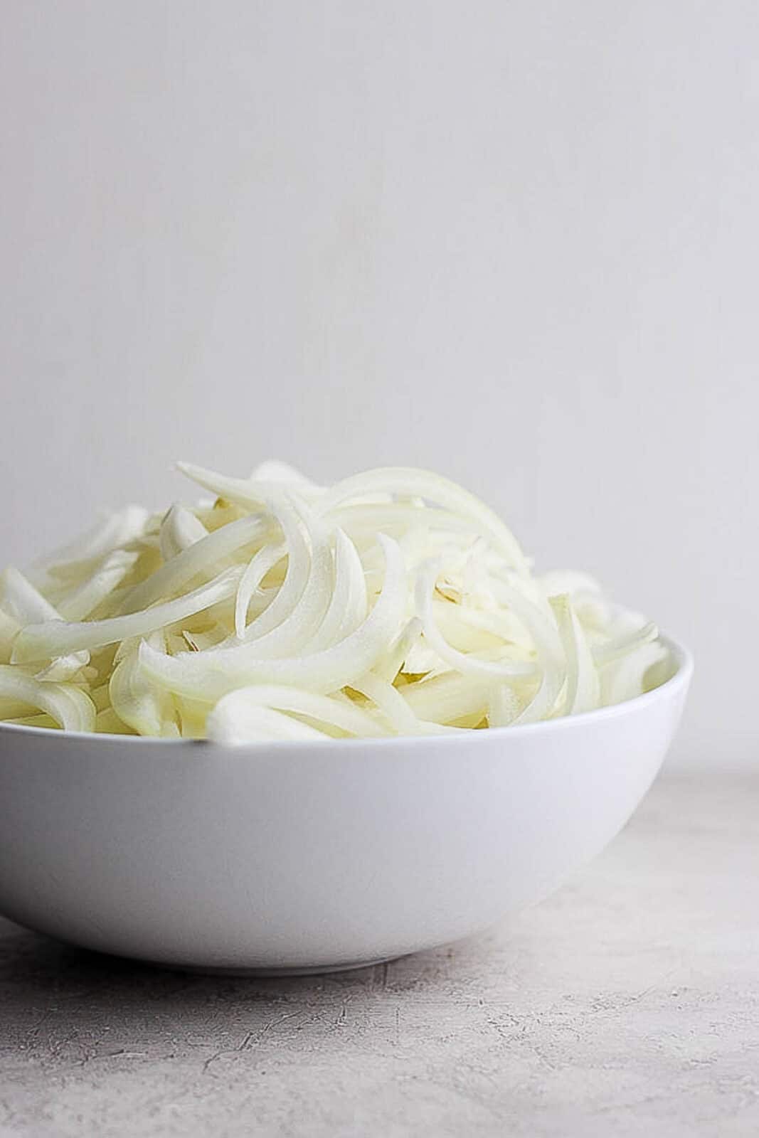 Onion slices in a bowl.