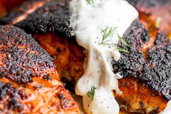Salmon with salmon dill sauce on top.
