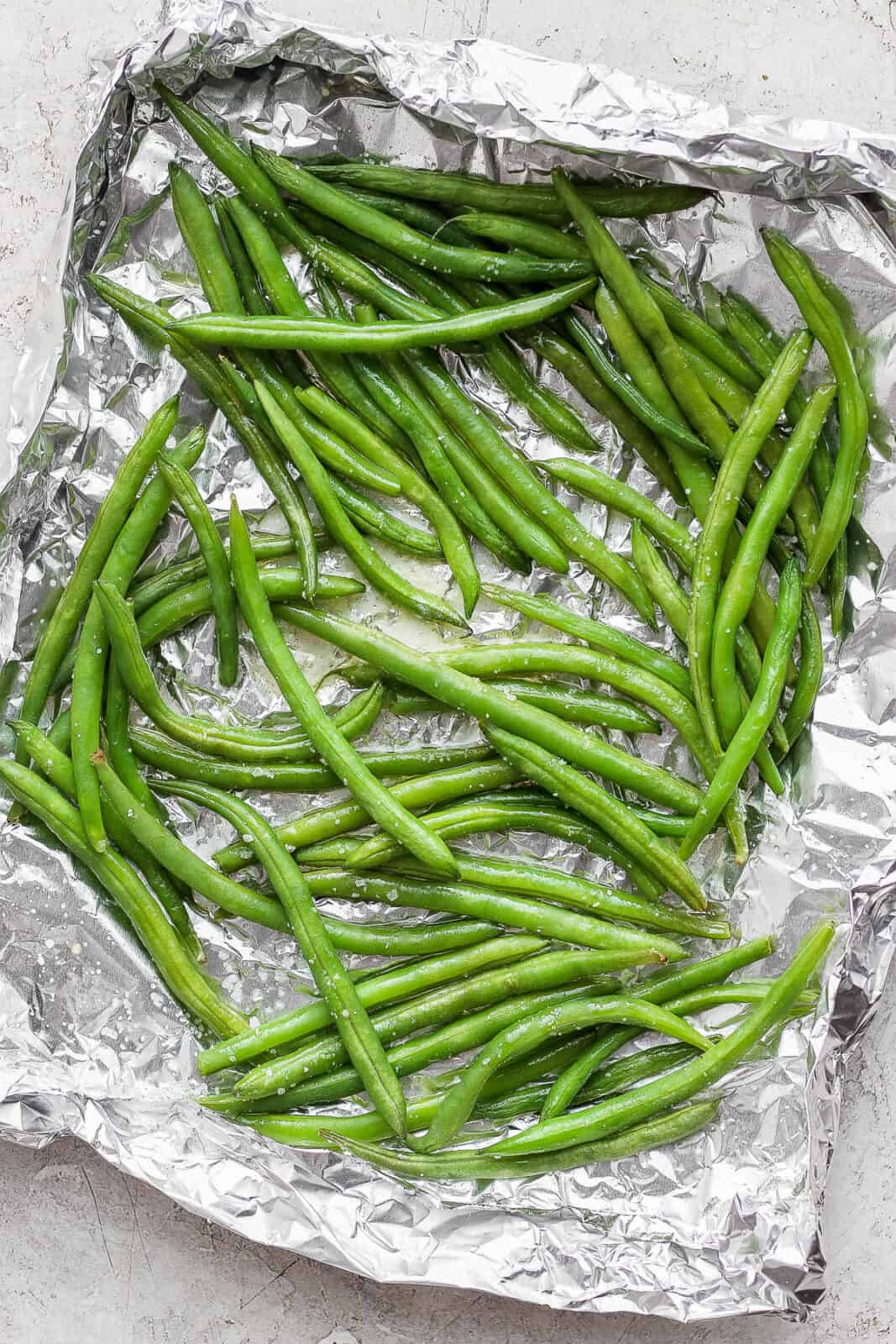 Green beans in foil after smoking. 