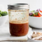 Mason jar with stir fry sauce inside.