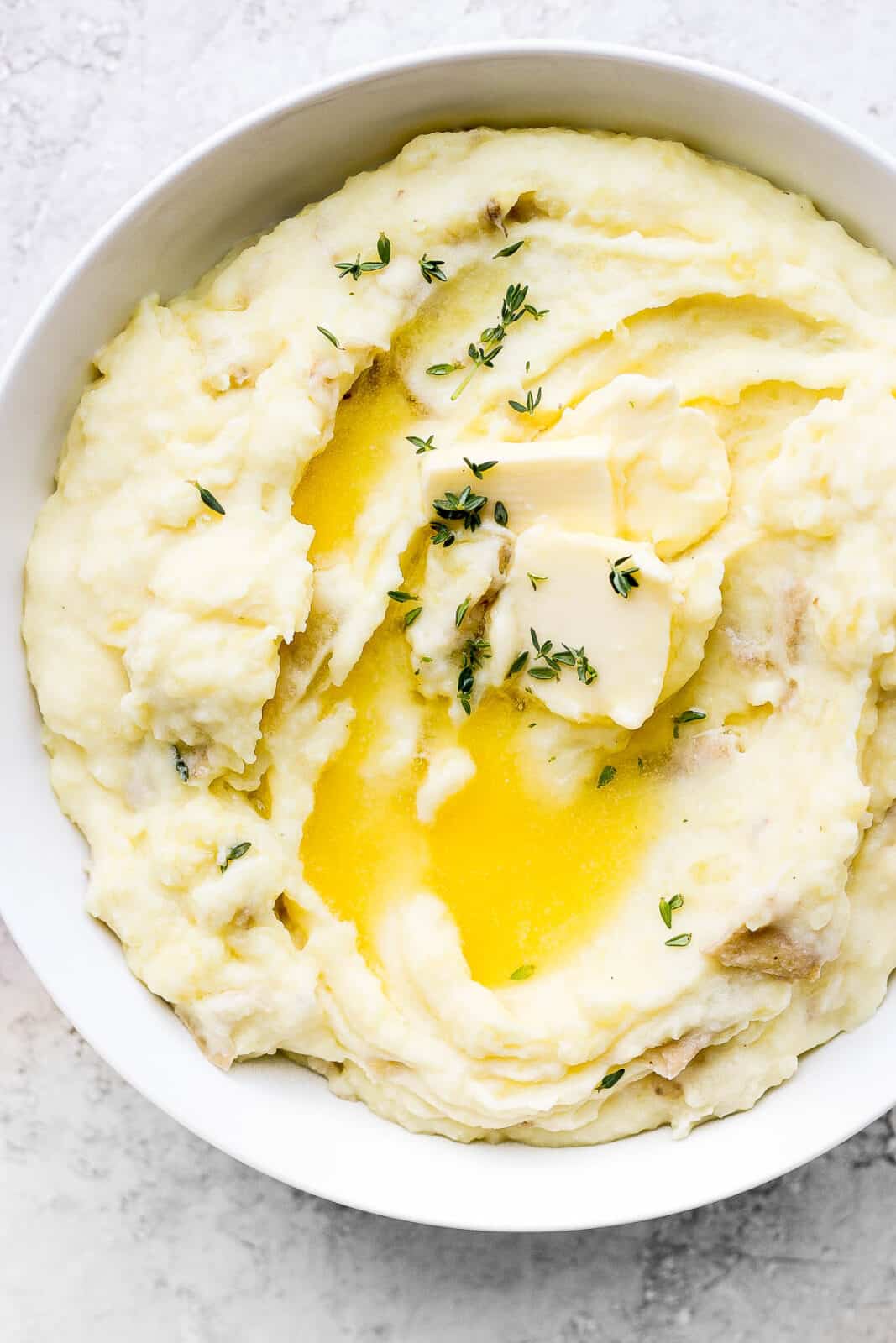 A bowl of mashed potatoes.