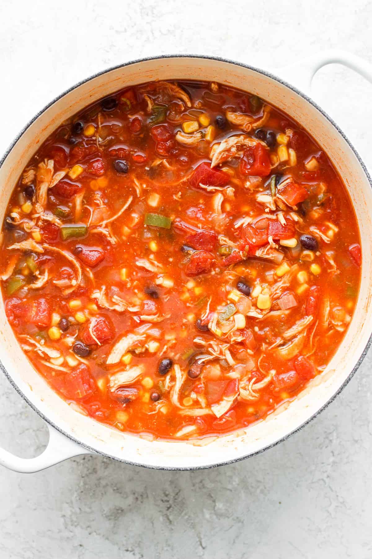 Chicken tortilla soup in a dutch oven.