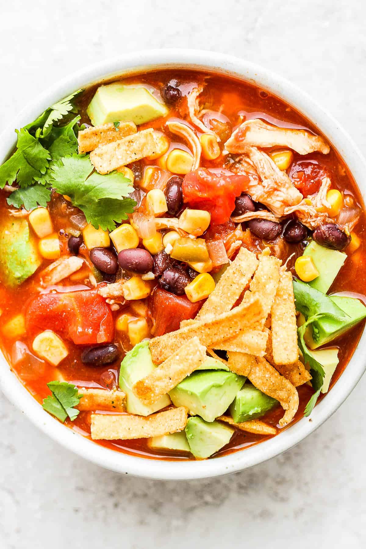 Chicken tortilla soup in a bowl.