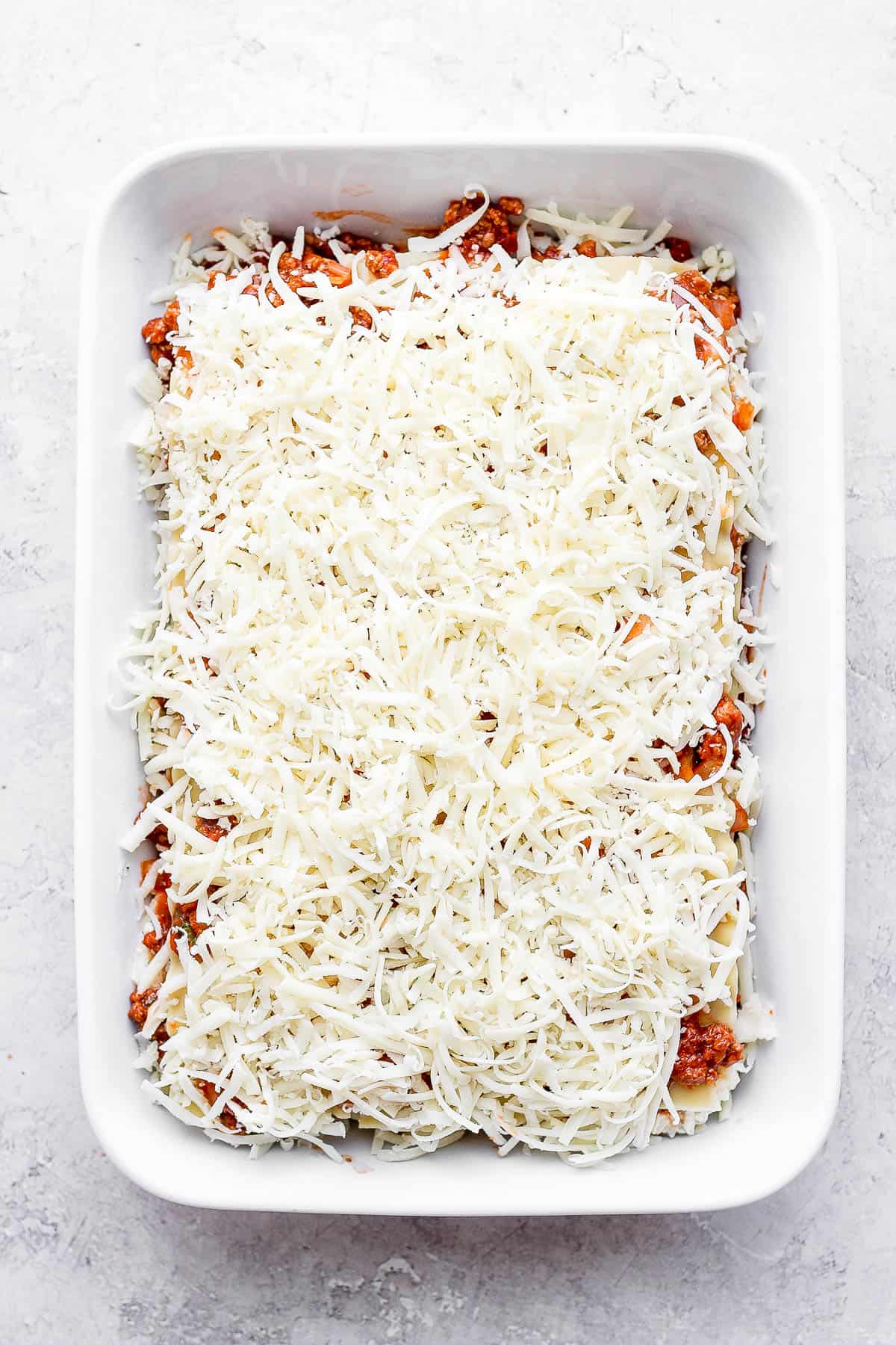 The fully layered lasagna before baking.