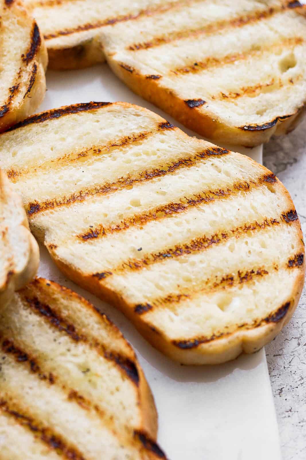 Grilled bread on a plate.