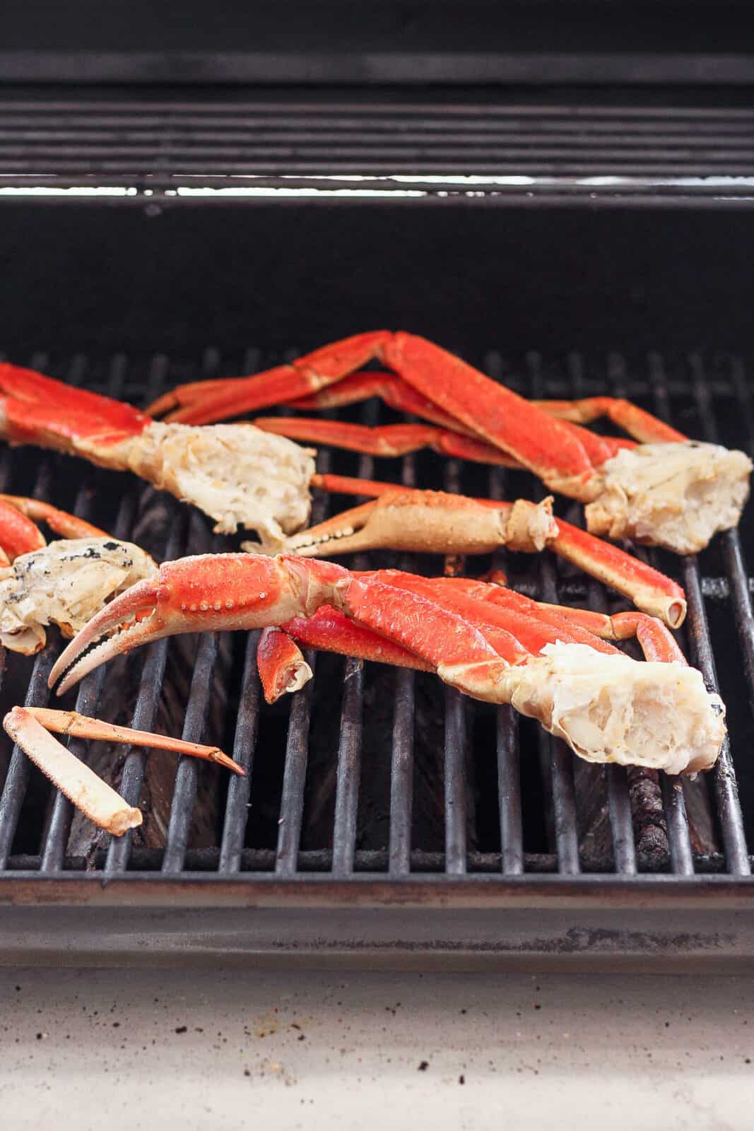 Crab legs on the grill.