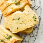 Bread basket full of homemade garlic bread.