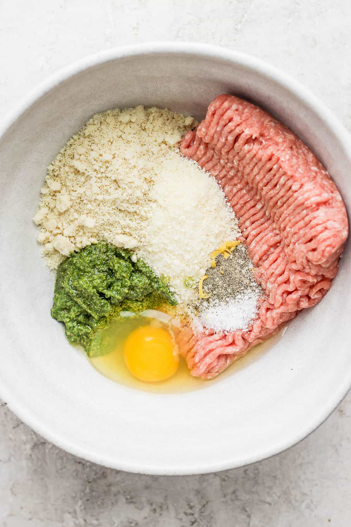 Bowl with ingredients inside, not mixed up. 