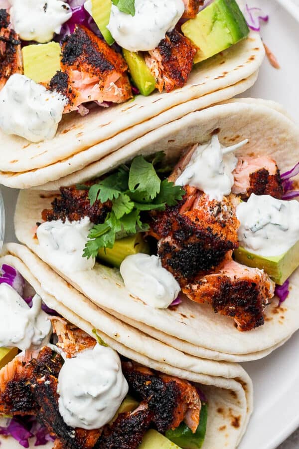 Plate of three blackened salmon tacos.