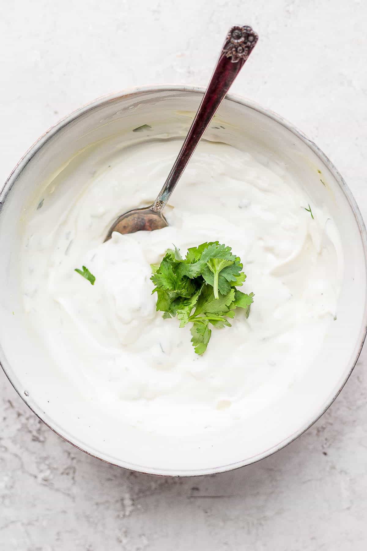 A bowl of cilantro lime crema.