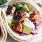 Blackened Salmon Tacos with cilantro lime crema.