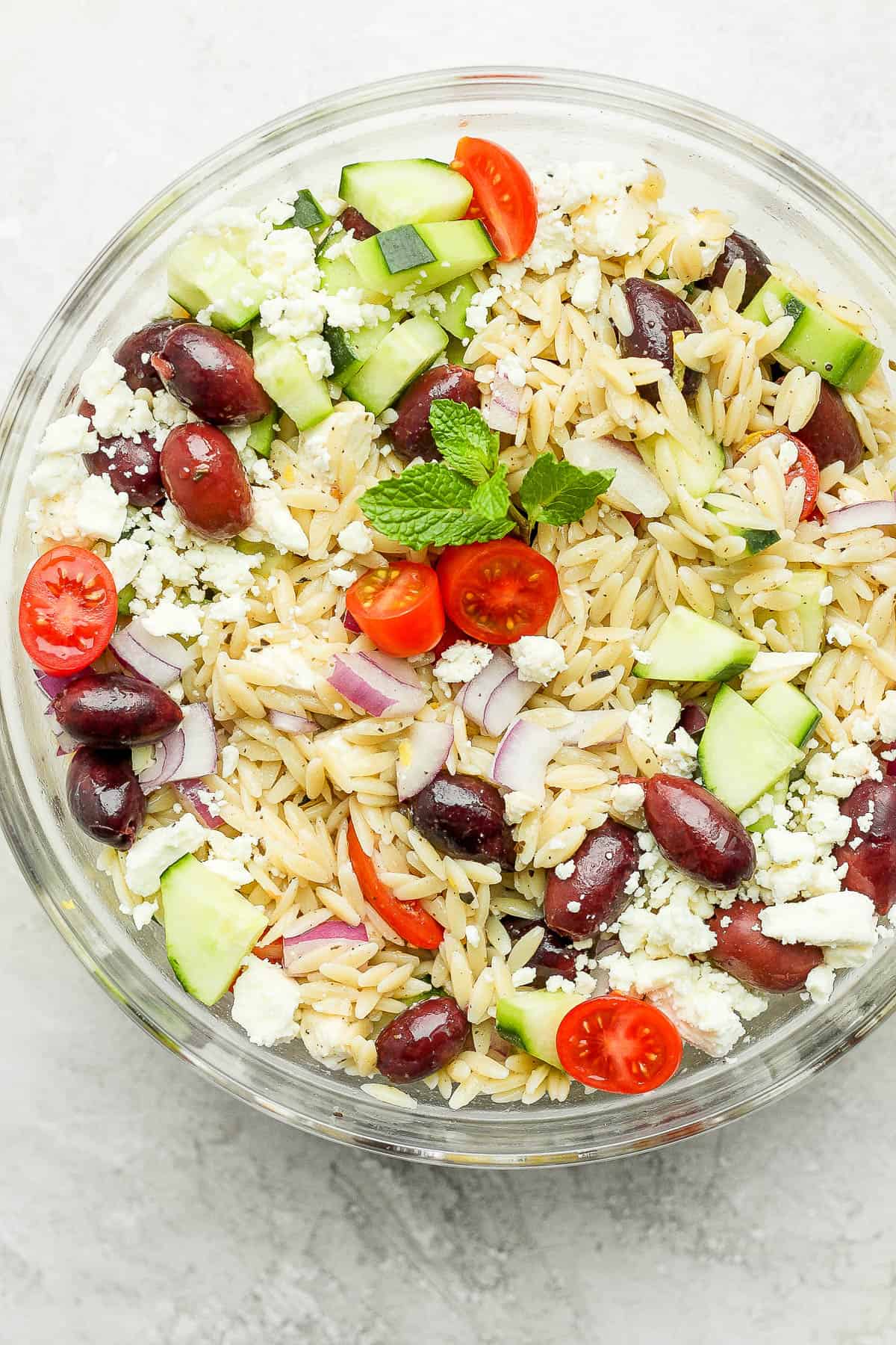 A large bowl of greek orzo pasta.