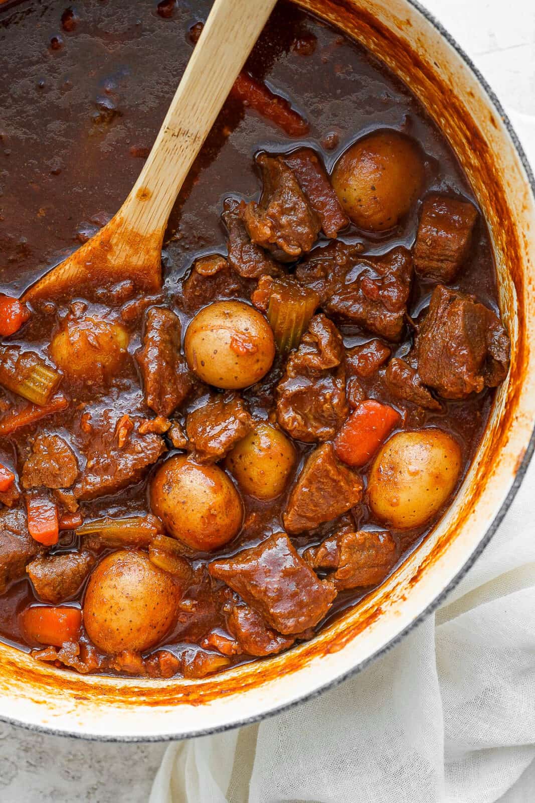 Close up of a dutch oven filled with Guinness Beef Stew.