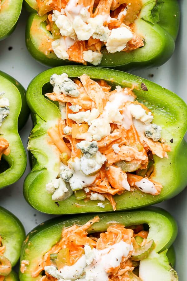 A pan filled with buffalo chicken stuffed peppers.