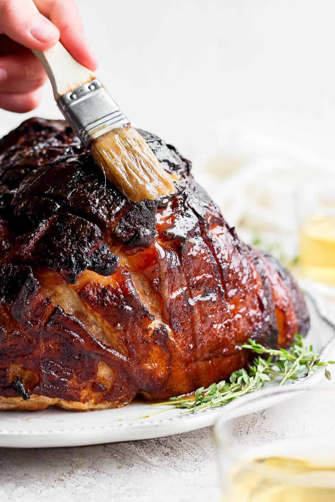 https://thewoodenskillet.com/wp-content/uploads/2022/04/honey-glazed-ham-recipe-7-1067x1600.jpg