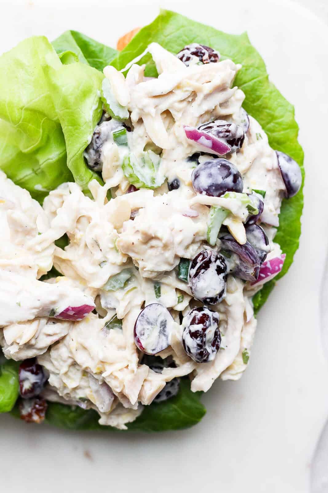 Smoked chicken salad on some lettuce. 