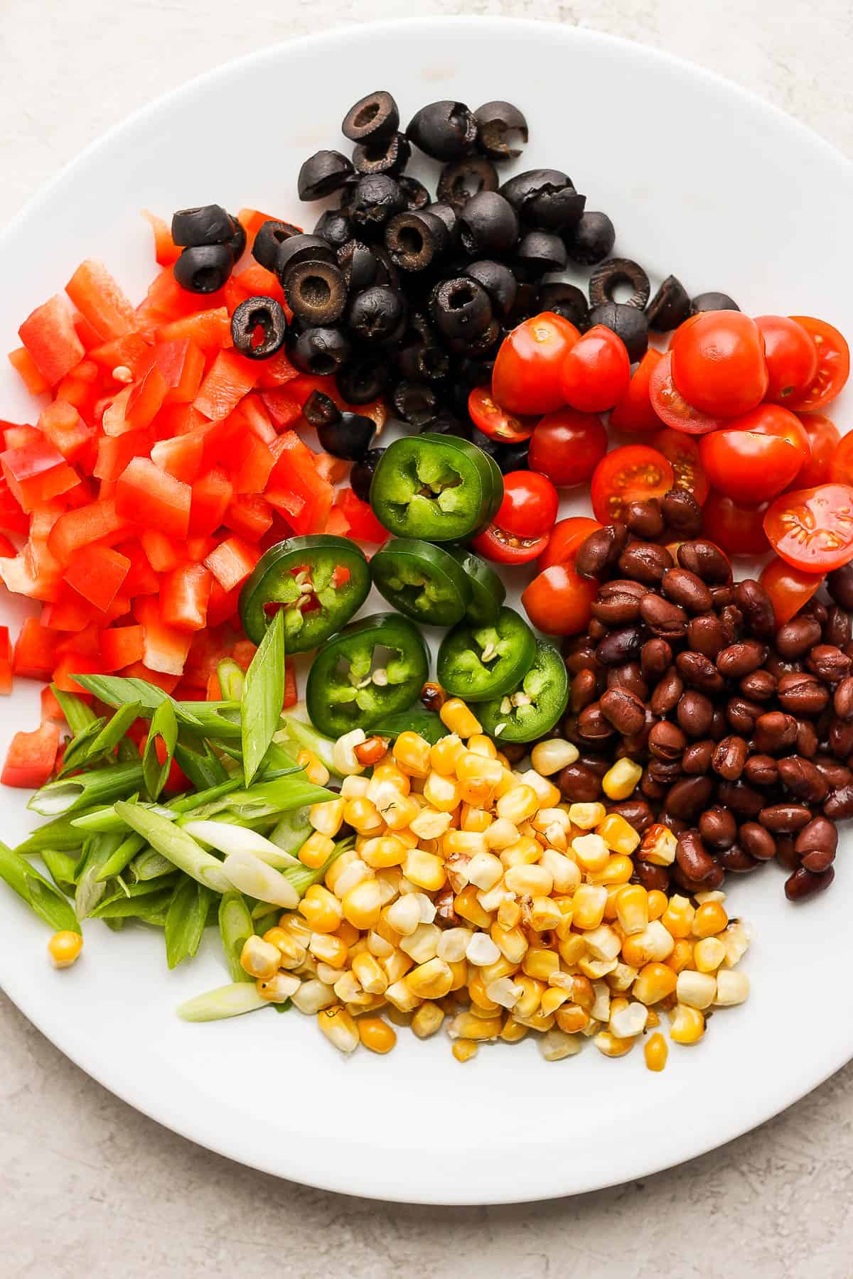 Santa fe topping ingredients on a plate.