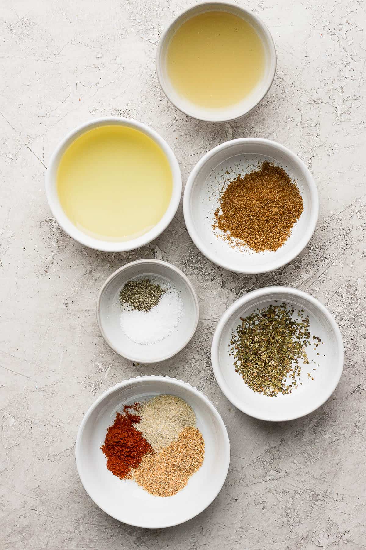 Southwest vinaigrette ingredients in separate bowls.