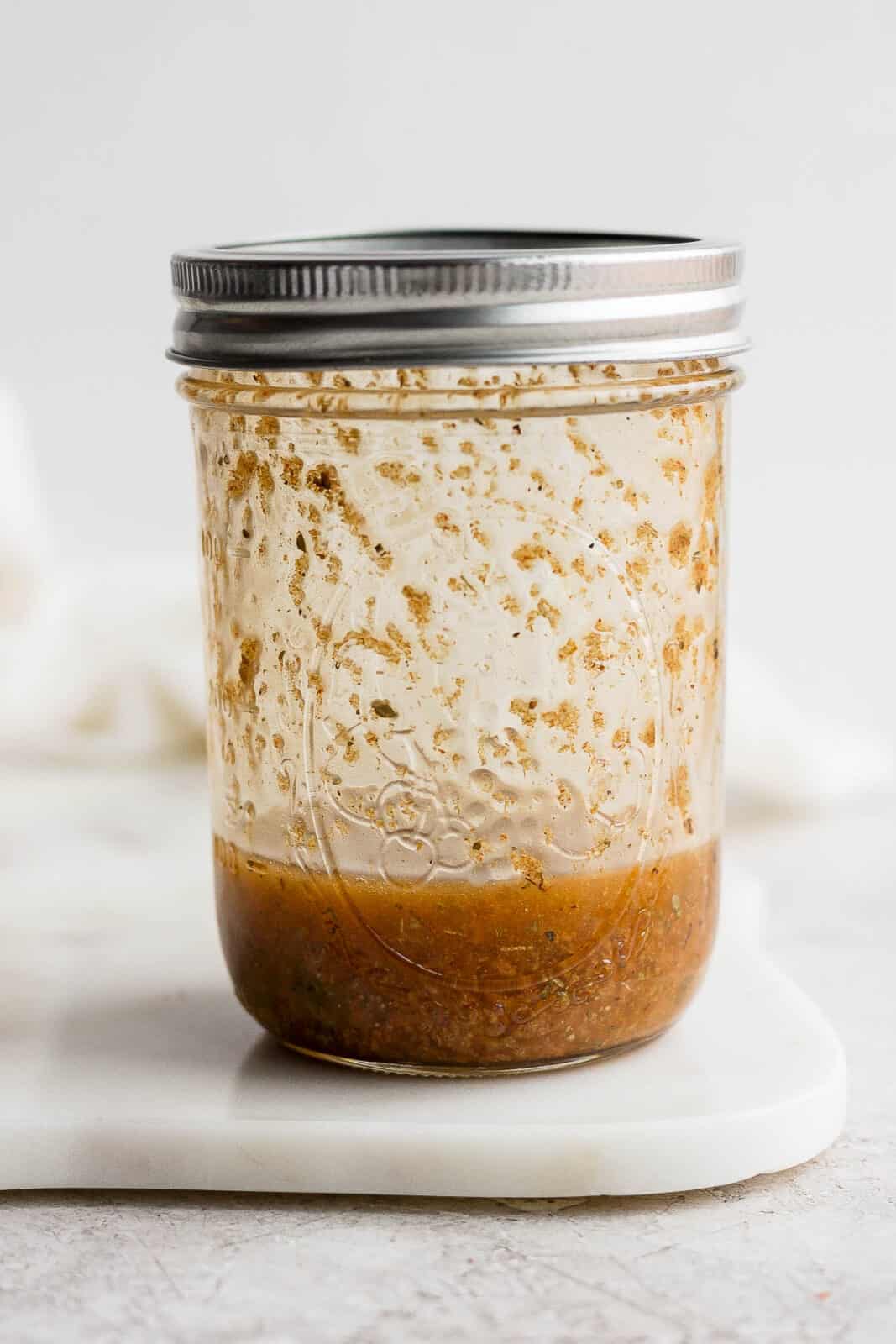 A homemade southwest vinaigrette recipe in a mason jar.