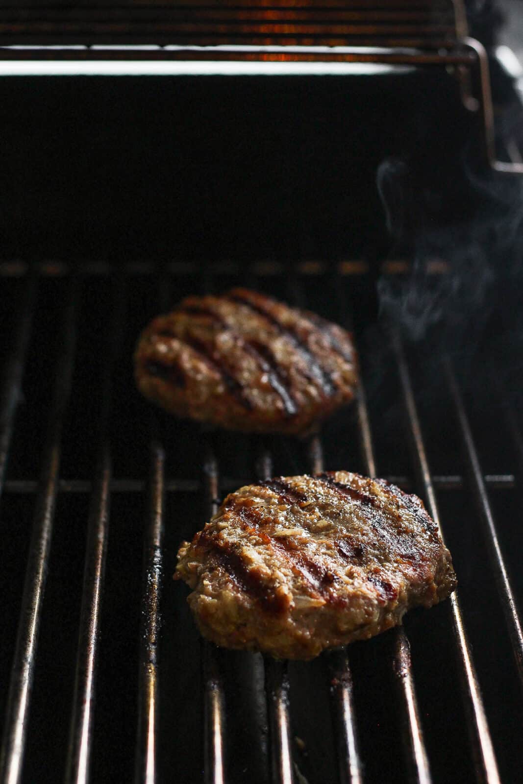 Grilled turkey burgers on the grill.