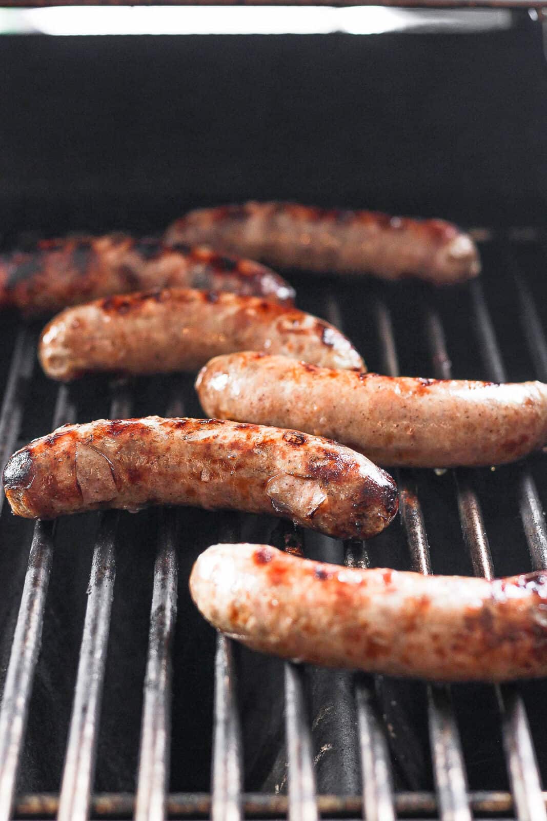 Beer boiled brats on the grill.