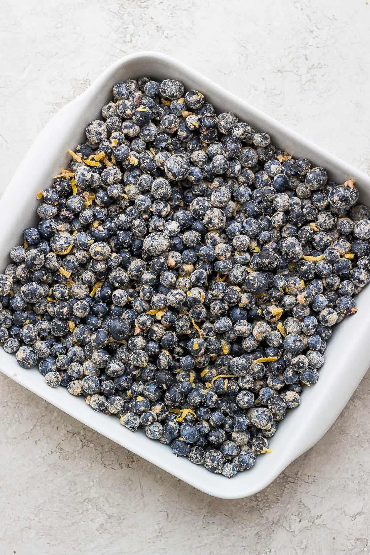 The blueberry mixture in a white baking dish.