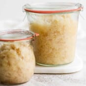 Two jars of homemade saurkraut.