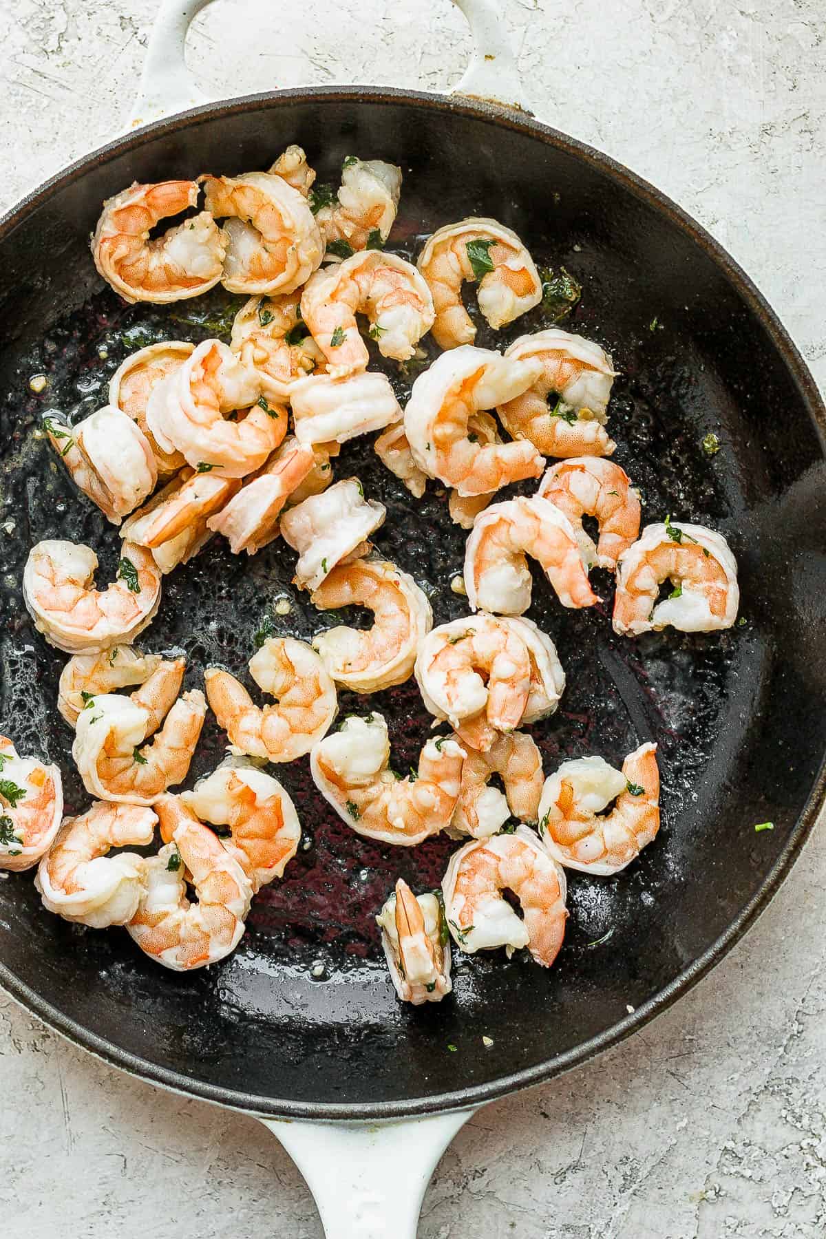 Shrimp being pan-fried.