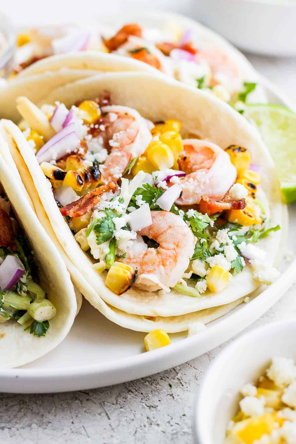 Side angle of a shrimp tacos. 