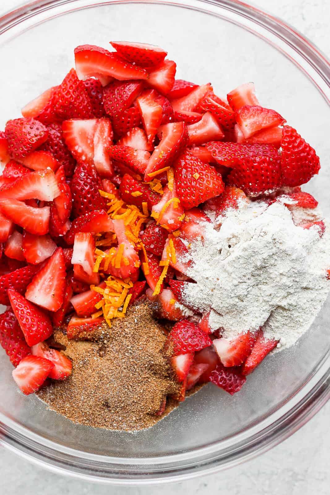 Strawberry filling ingredients in a bowl.