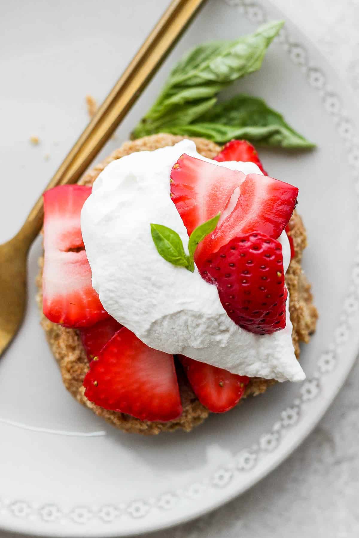 A healthier strawberry shortcake on a plate.