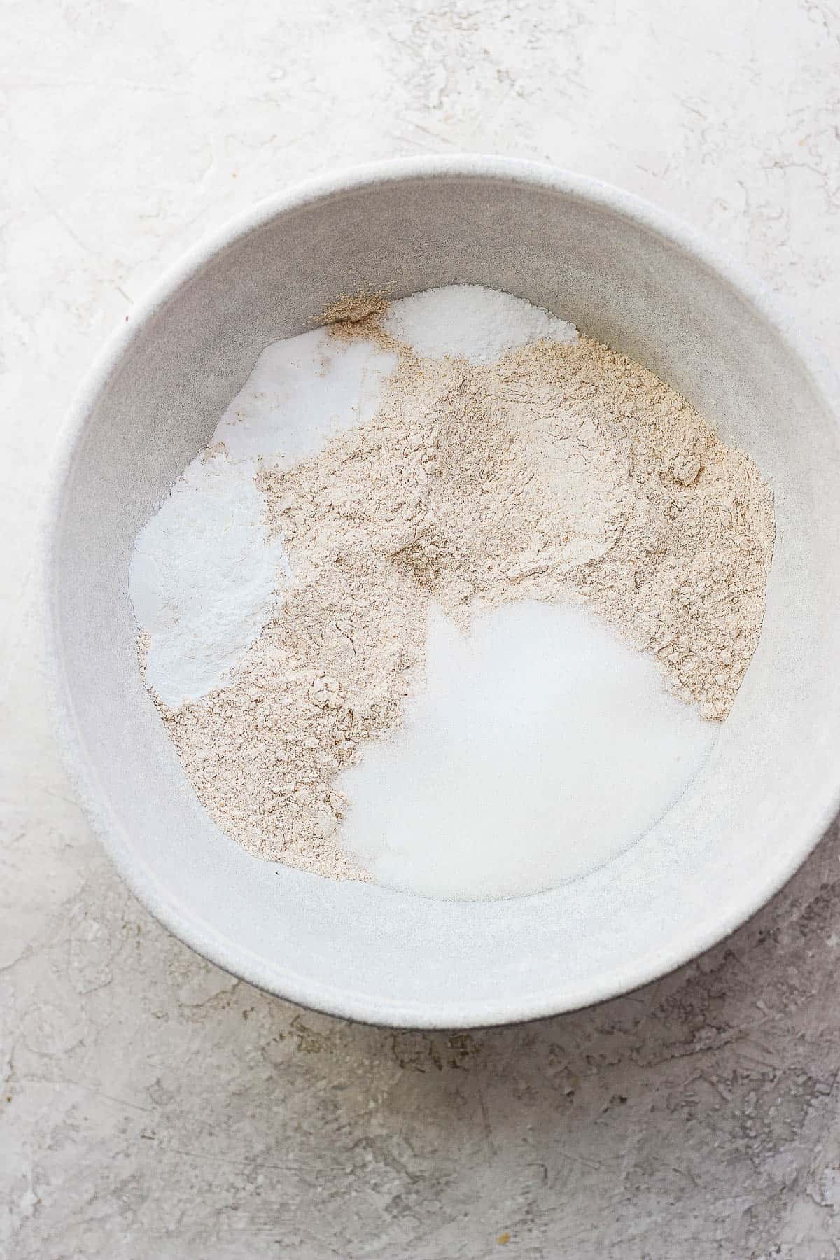 Dry ingredients in a mixing bowl for the shortcakes.