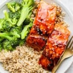 Plate of teriyaki salmon, broccoli and brown rice.