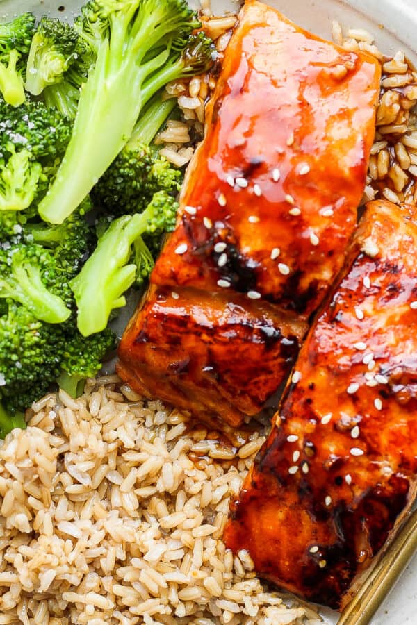 Plate of teriyaki salmon, broccoli and brown rice.