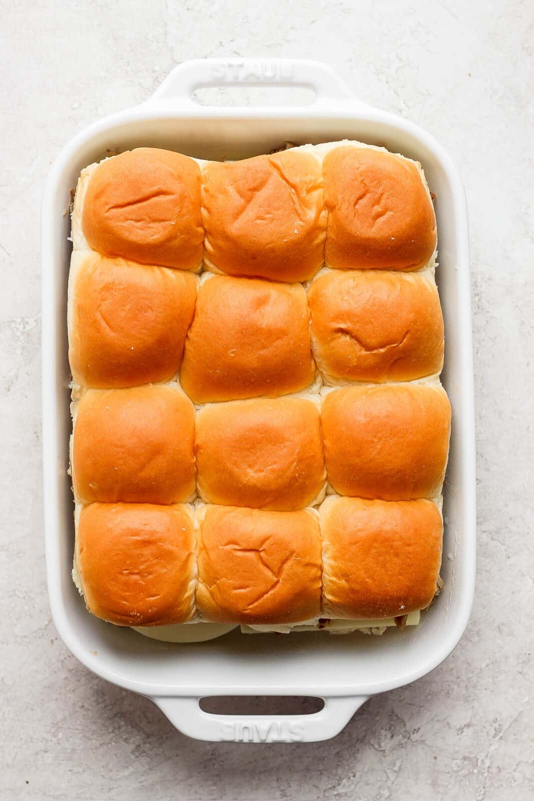 The top dinner rolls added to the top.