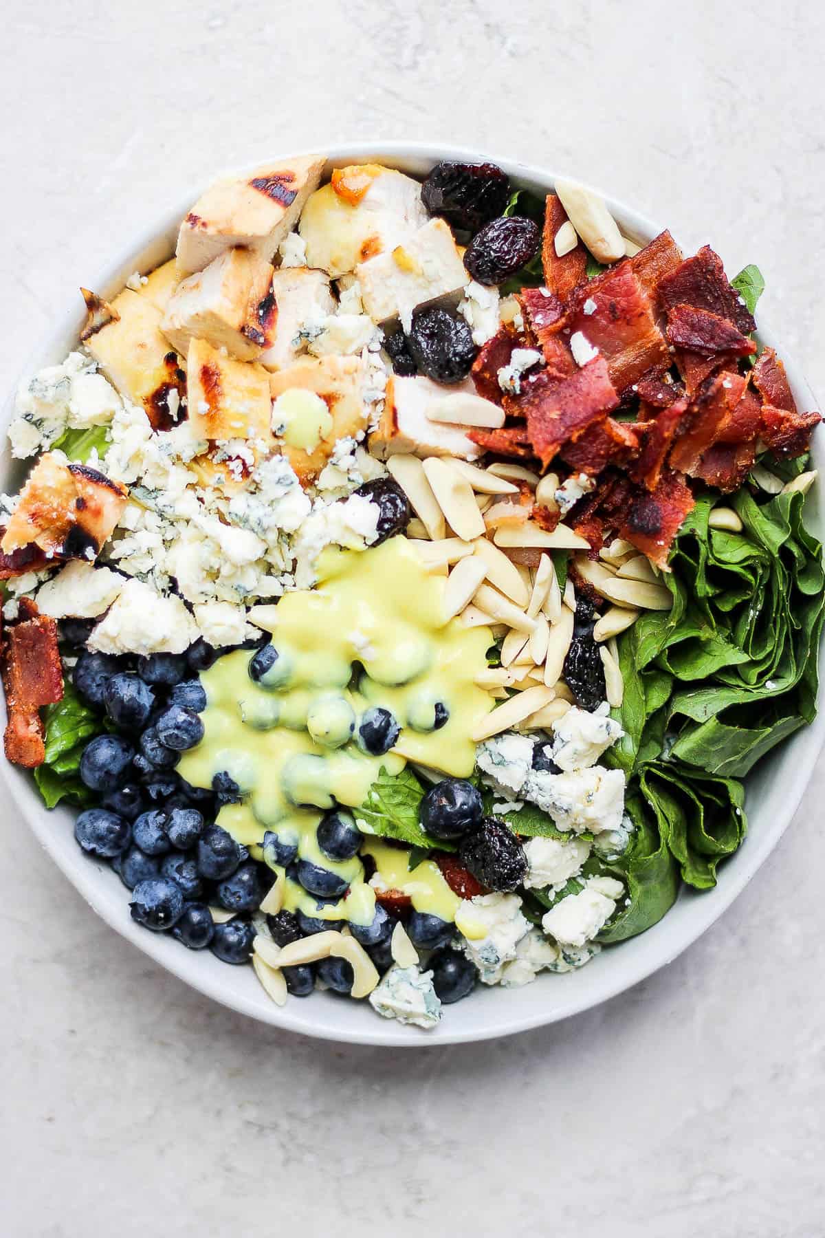 A honey mustard chicken salad in a bowl.