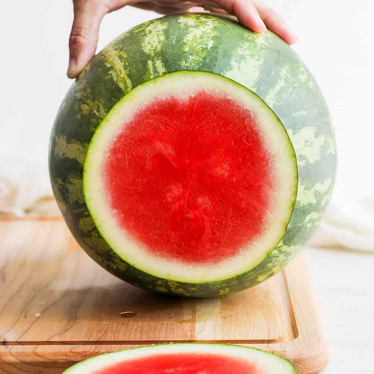 A watermelon with the end cut off.