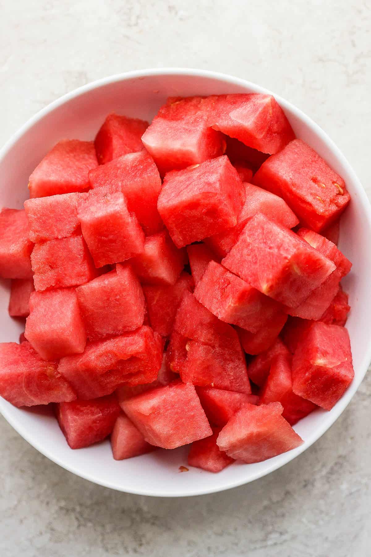 Cubes of watermelon in a bowl.