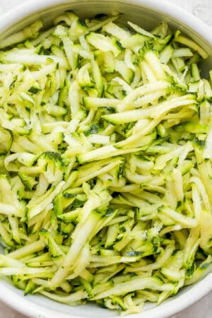 A bowl of grated zucchini.
