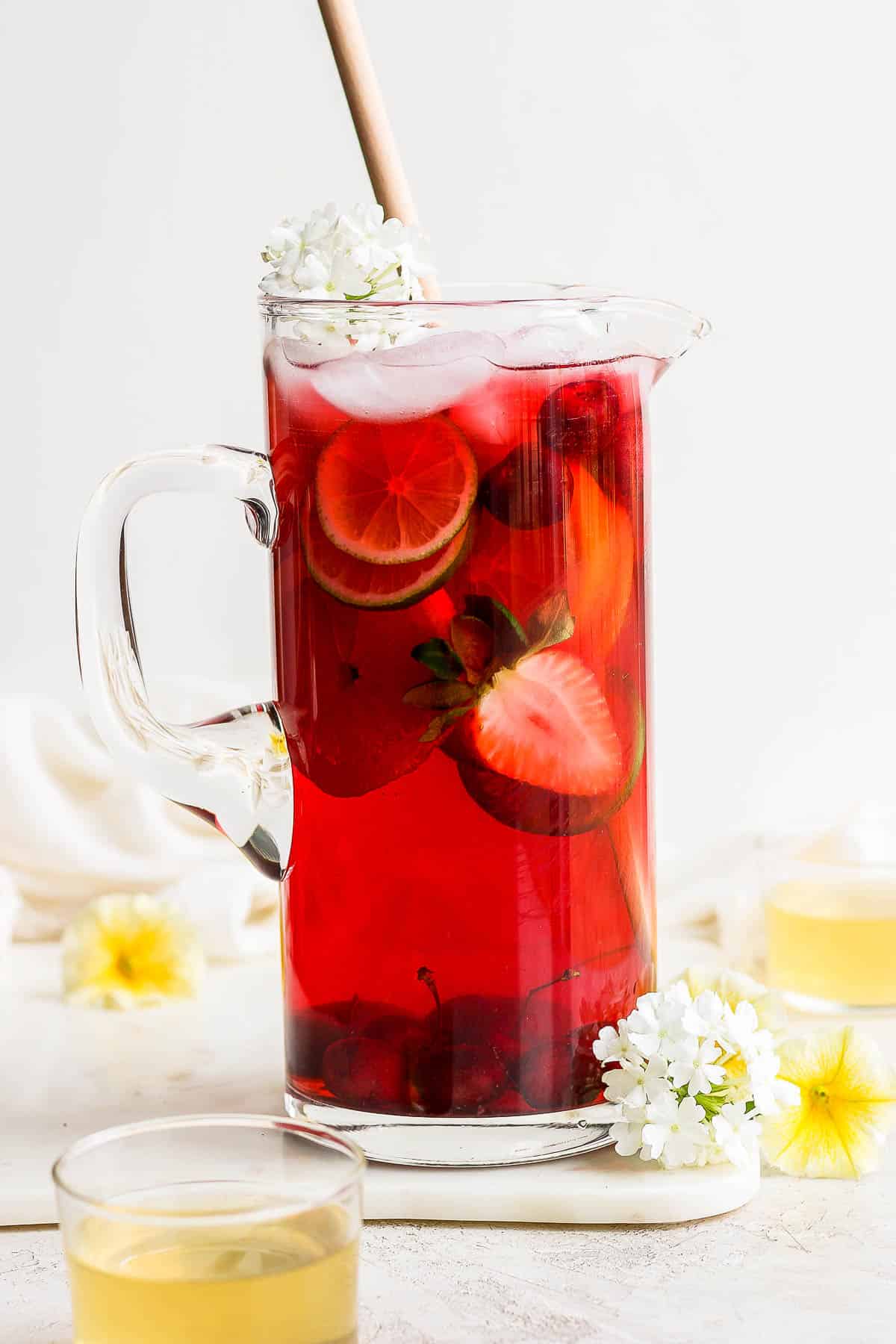 Large pitcher of fruit infused cold brew iced tea.