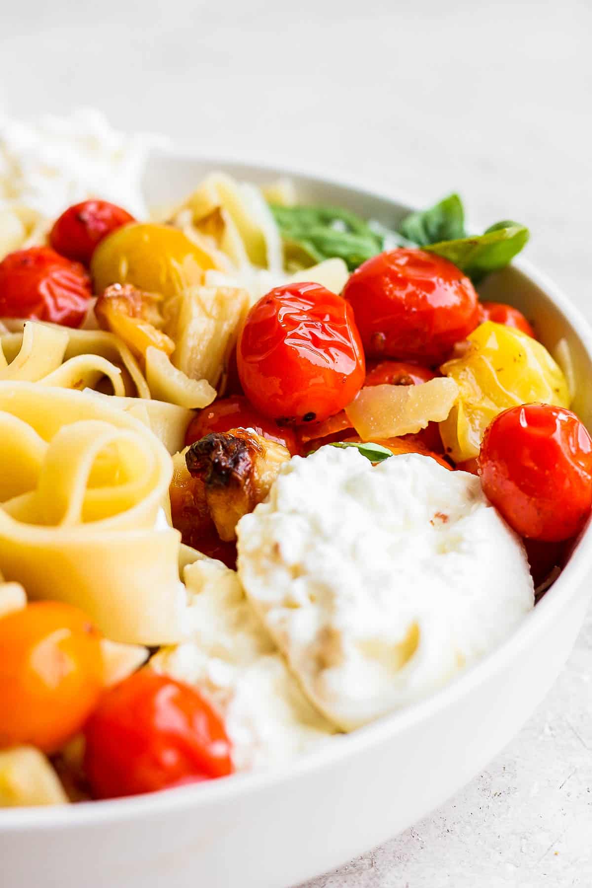 An easy summer pasta with burrata cheese.