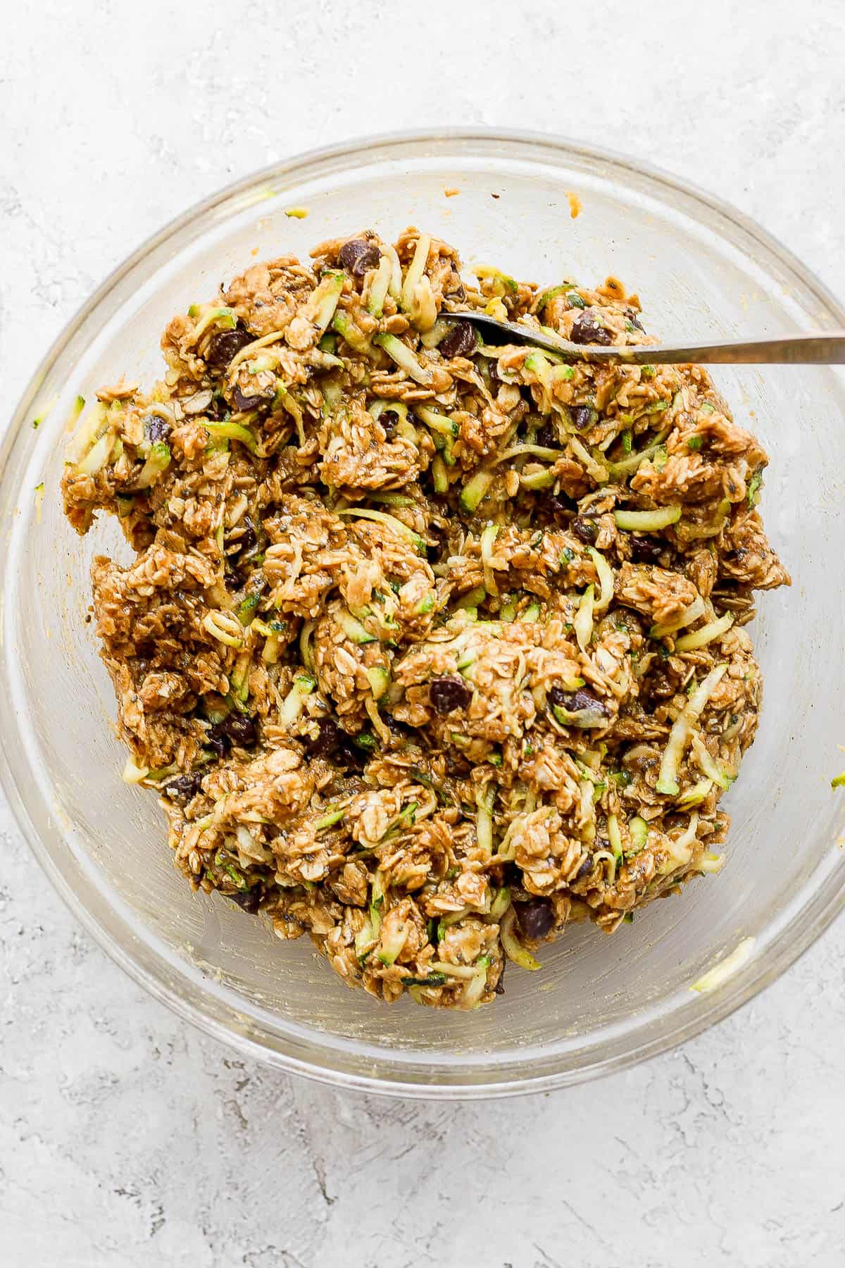 Zucchini cookie dough in a mixing bowl.